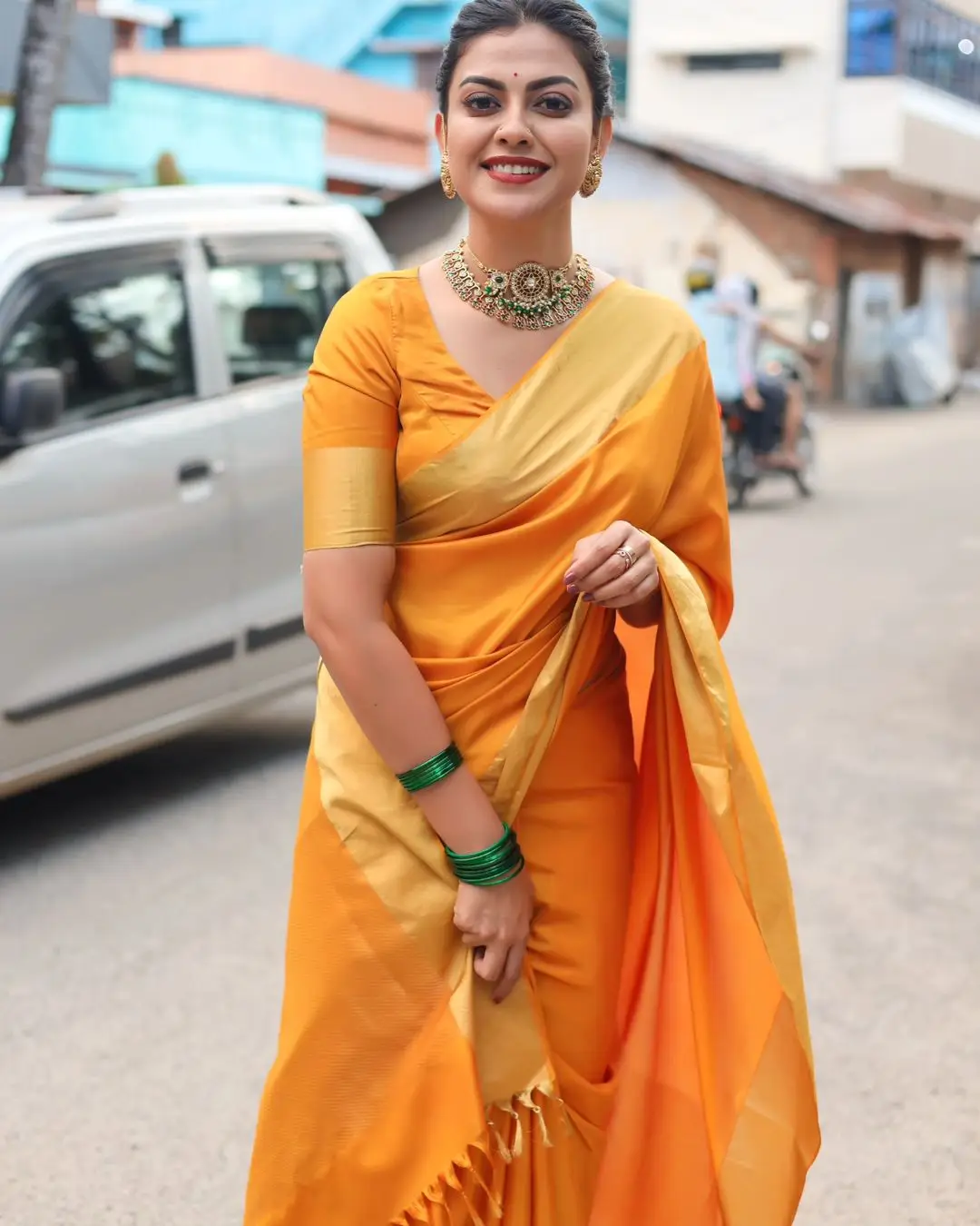 Anusree Nair Wearing Beautiful Earrings Jewellery Orange Saree Blouse